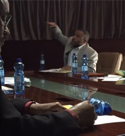 Ethiopia Environment Minister Ato Kare Debessa looks on as Ministry of Education official outlines climate change priorities.